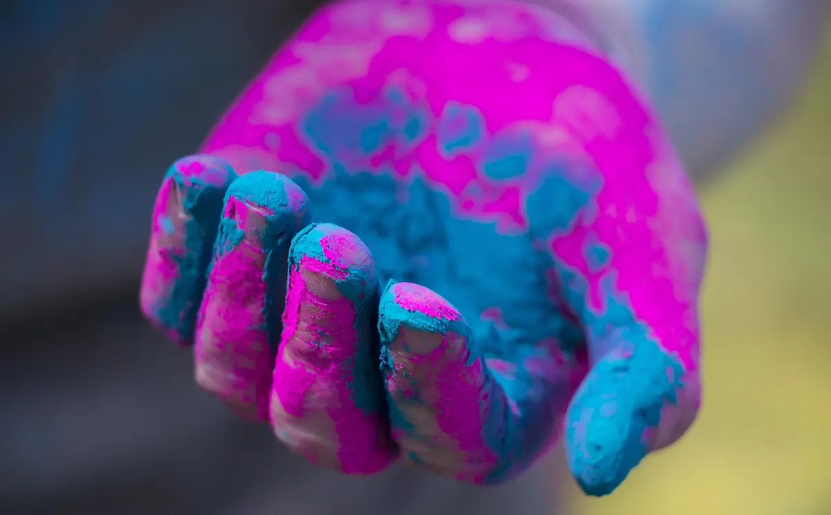 Hand, rang barse, holi — illustrating How to Choose Brand Colors That Work (2026 Guide)