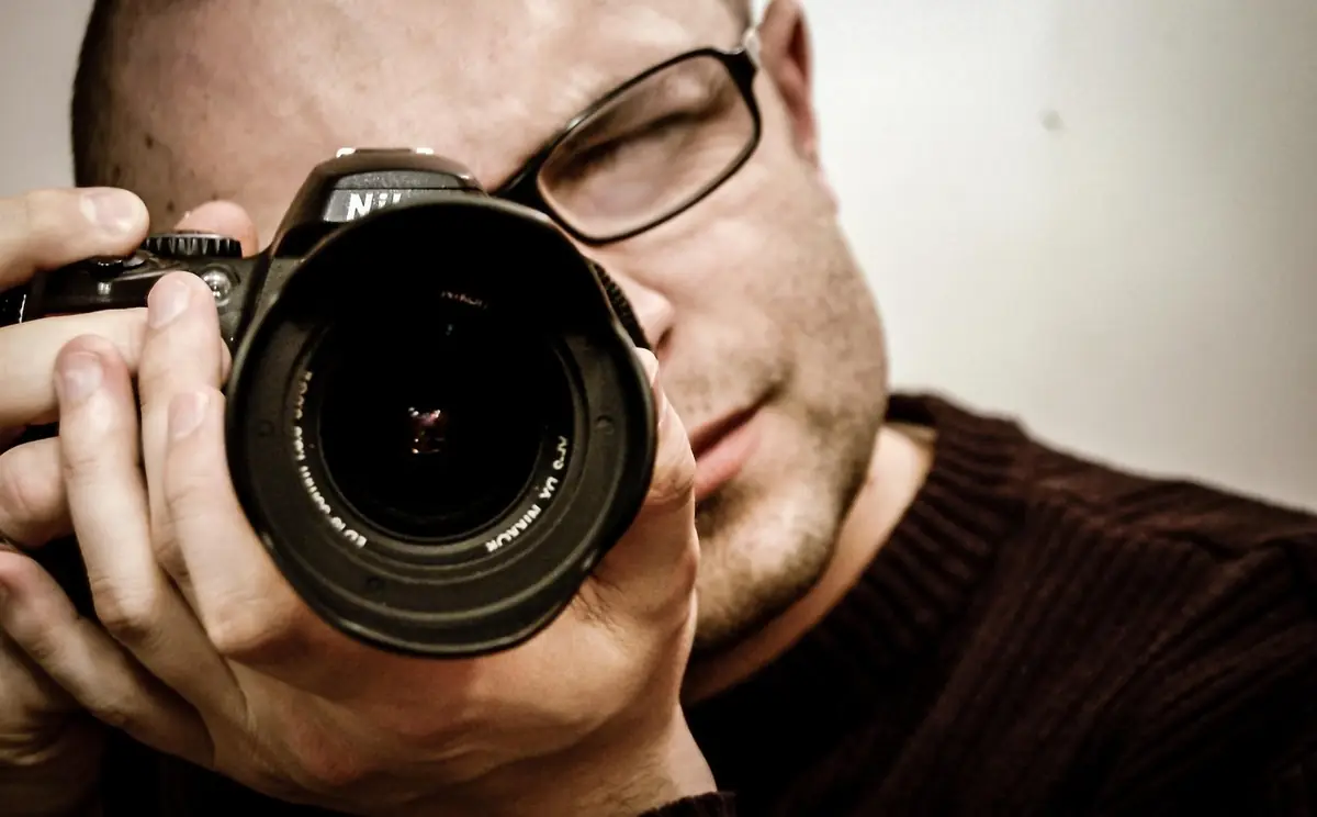 Photographer, camera, photography — illustrating SVG & Decorative Shape Tools for Web Design (2026)